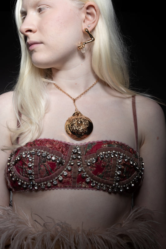 "Tortured nature" pendant in silver-plated brass
